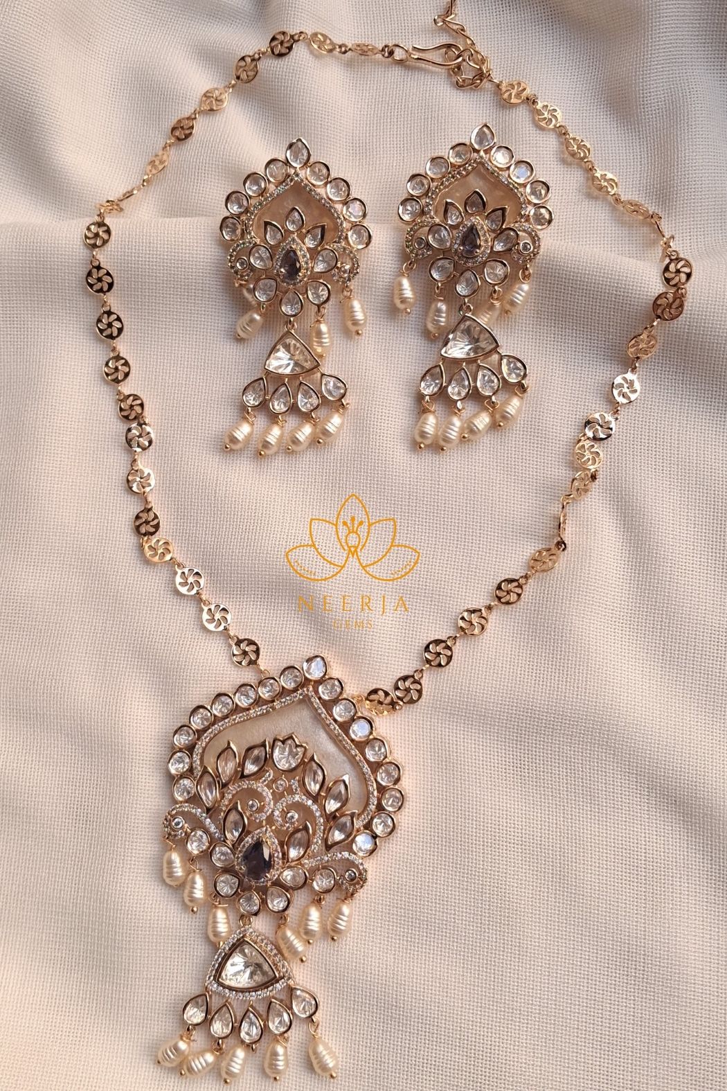 Regal Pearl Kundan Pendant Set